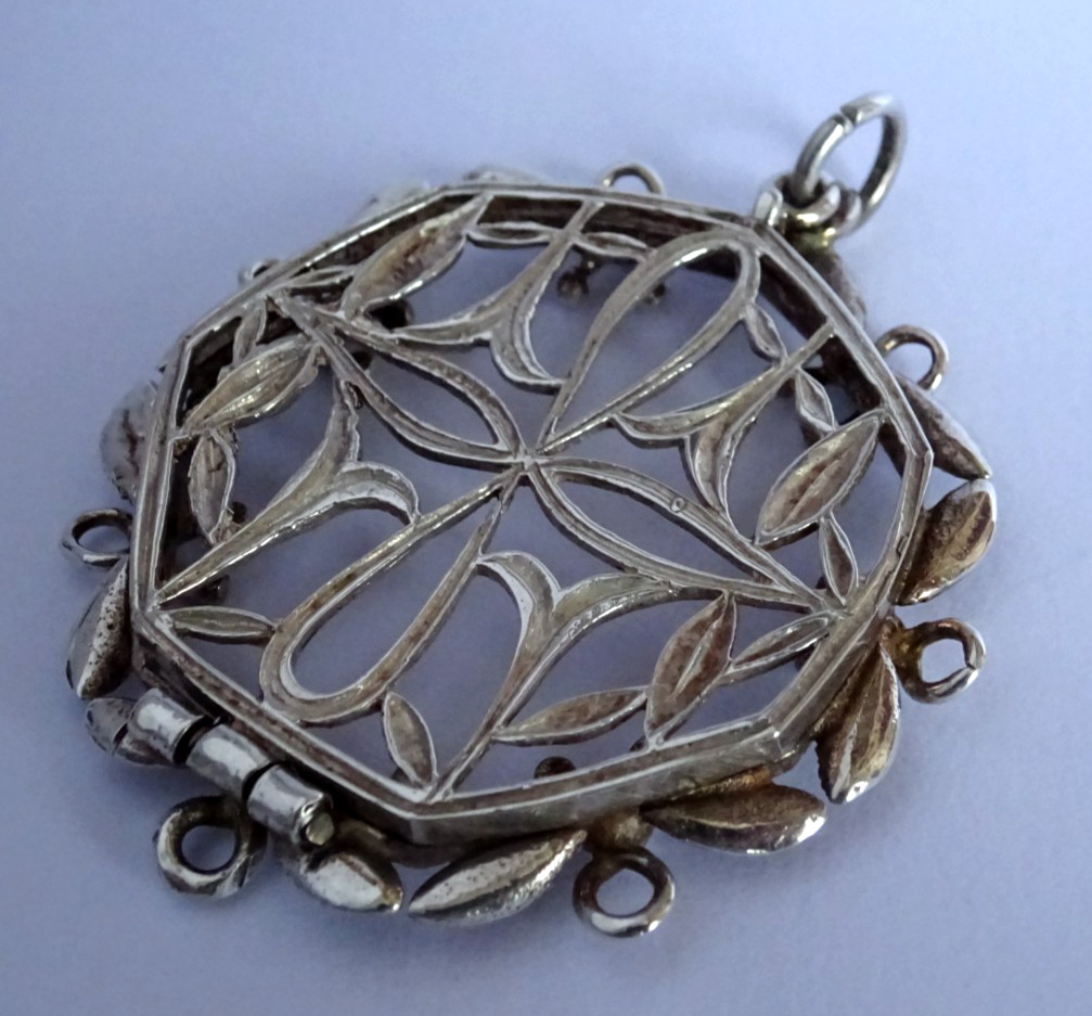 Unusual antique solid sterling silver hinged photo locket pendant