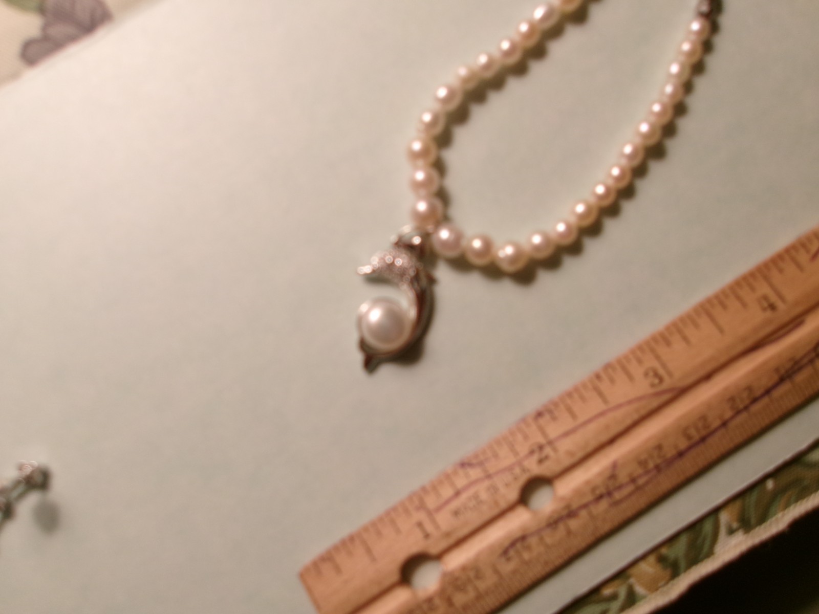 PEARL BRACELET WITH REAL PEARLS I MADE THIS ONE DOLPHIN SO PRETTY