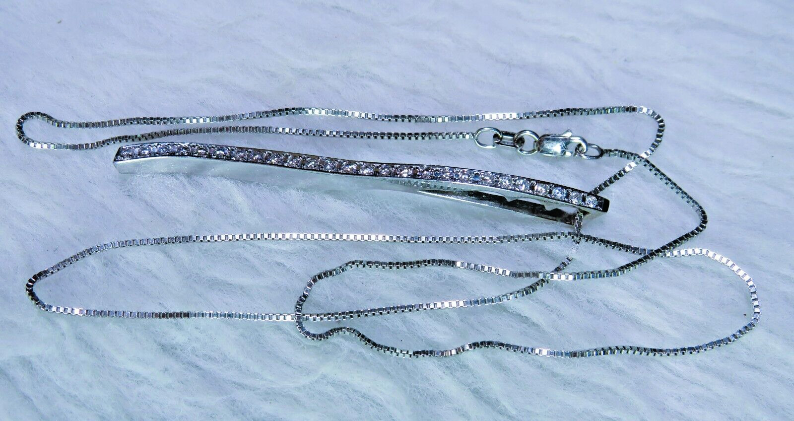 unique 14K white gold wavy Journey Diamond Pendant w/neck.