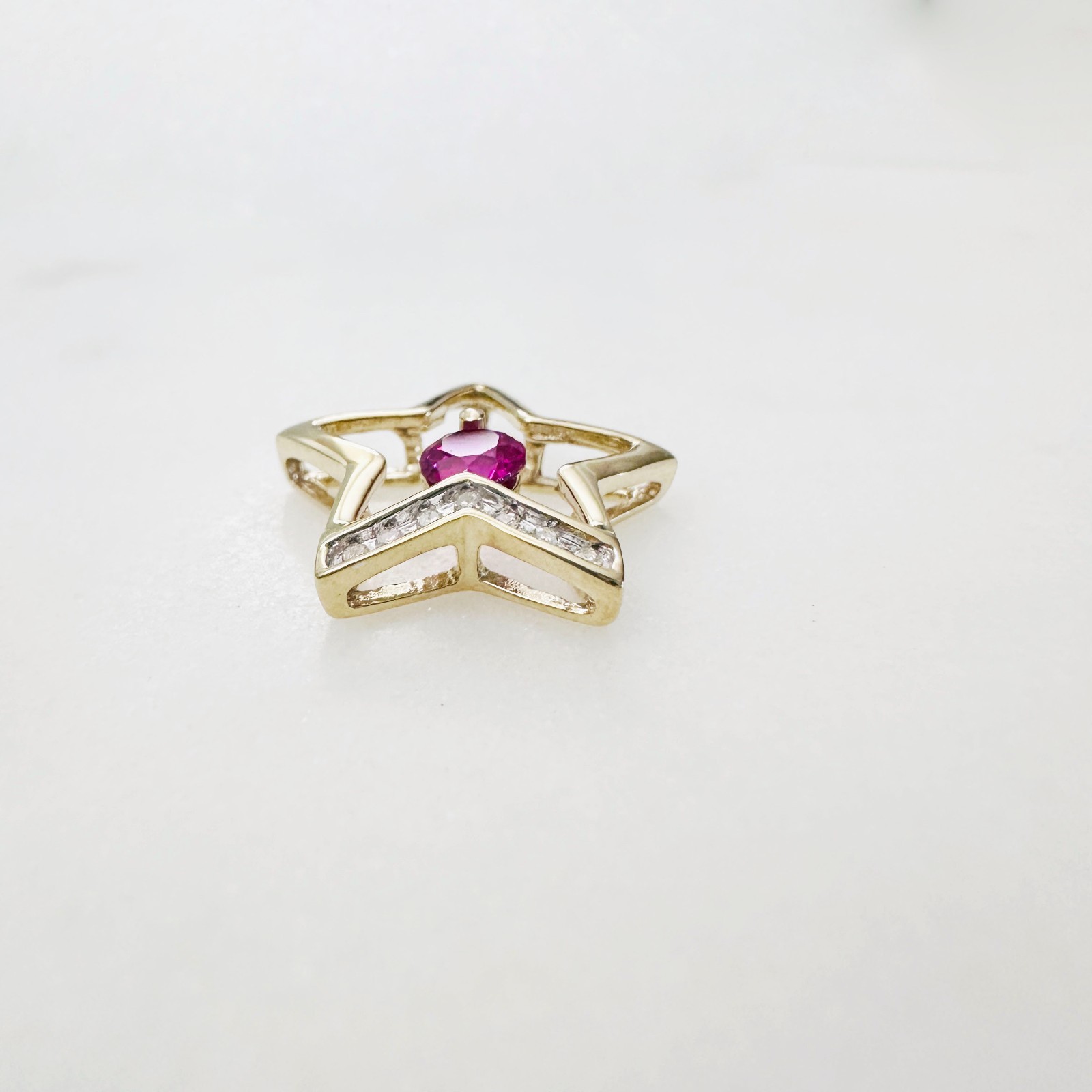 Solid 10K Yellow Gold .25ct Ruby & 7 Diamond Open Star Pendant 16mm, 1.2g