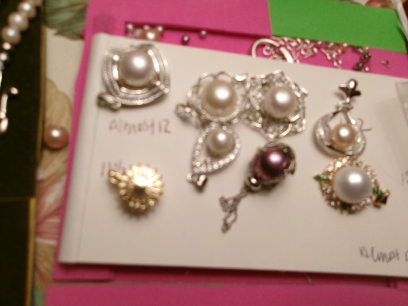 PEARL IN CAGE ABOUT 12.50 TO 13MM BETWEEN.COLOR FABULOUS I PAID 75.00 FOR THE P