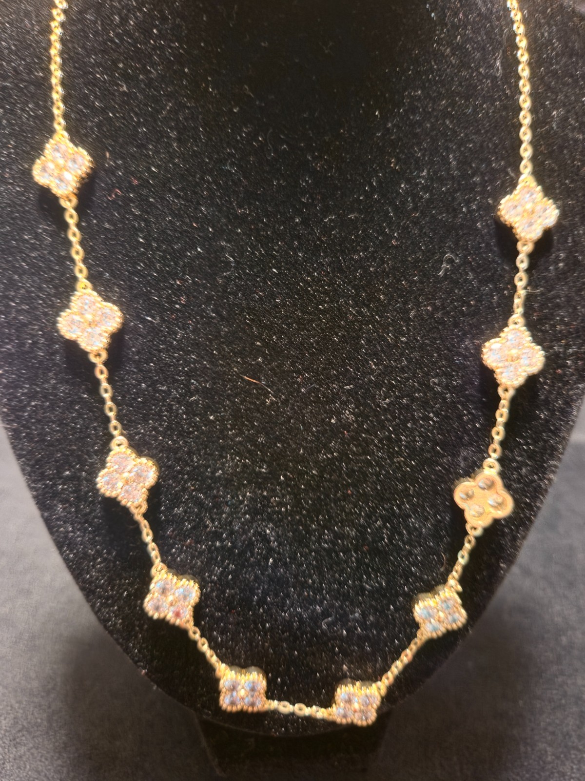 14k Yellow Gold Filled Chain Necklace with a Clovers and clear stones