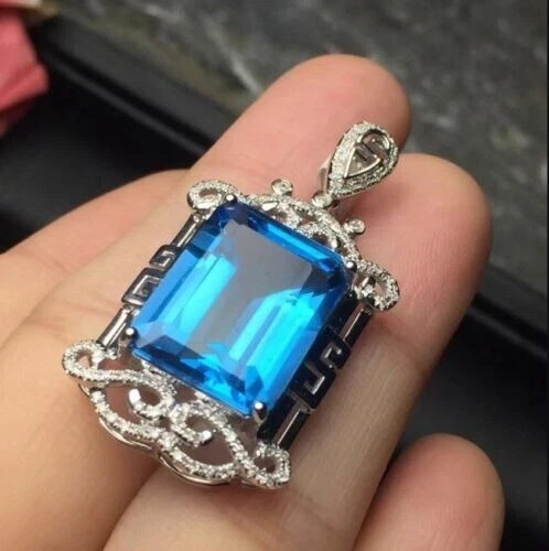 1.30 CT Solitaire Emerald Cut London Blue Topaz Pendant in 14K Gold Finish
