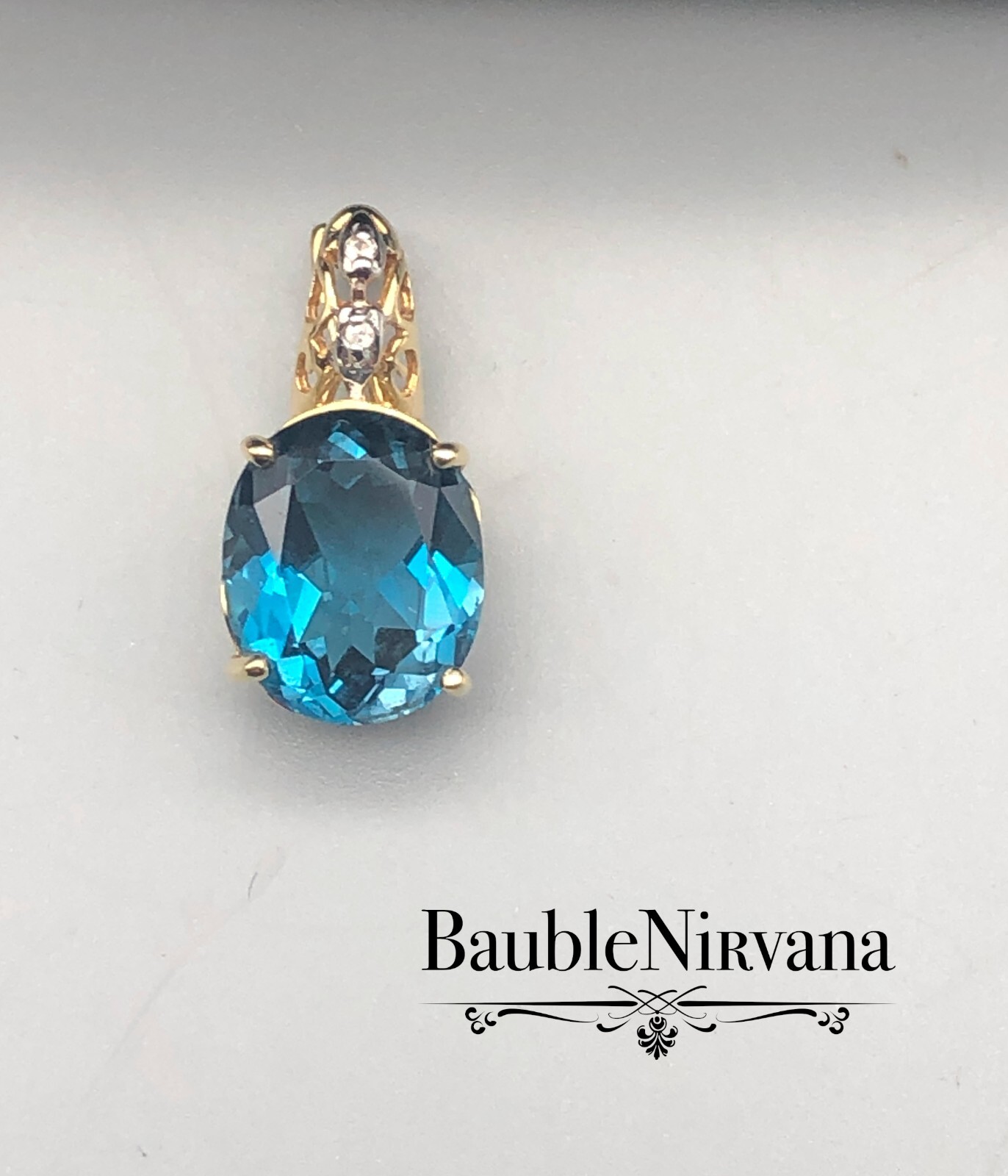 Vintage 14K Yellow & White Gold Filigree Oval Blue Topaz Pendant