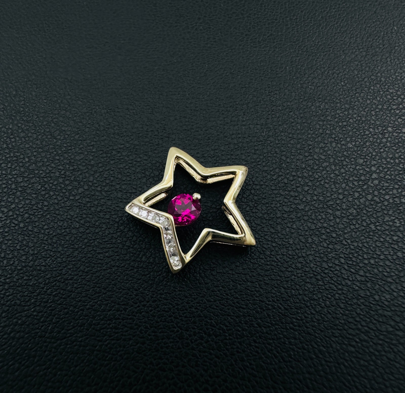 Solid 10K Yellow Gold .25ct Ruby & 7 Diamond Open Star Pendant 16mm, 1.2g