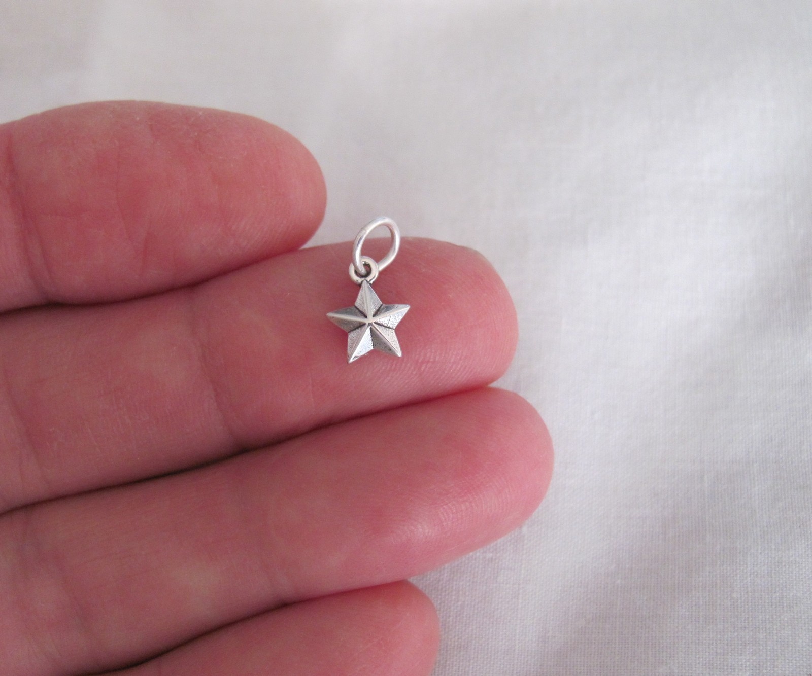 Very small Sterling Silver Star mini tiny charm.