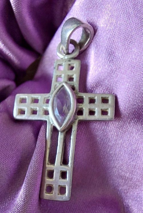 Charles Rennie Mackintosh style, sterllng silver cross, with pale purple stone