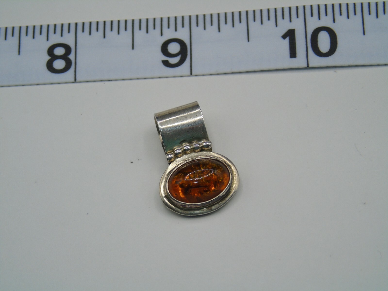 R. WILSON STERLING SILVER AND OPAL PENDANT IN PRE-OWNED VERY GOOD CONDITION