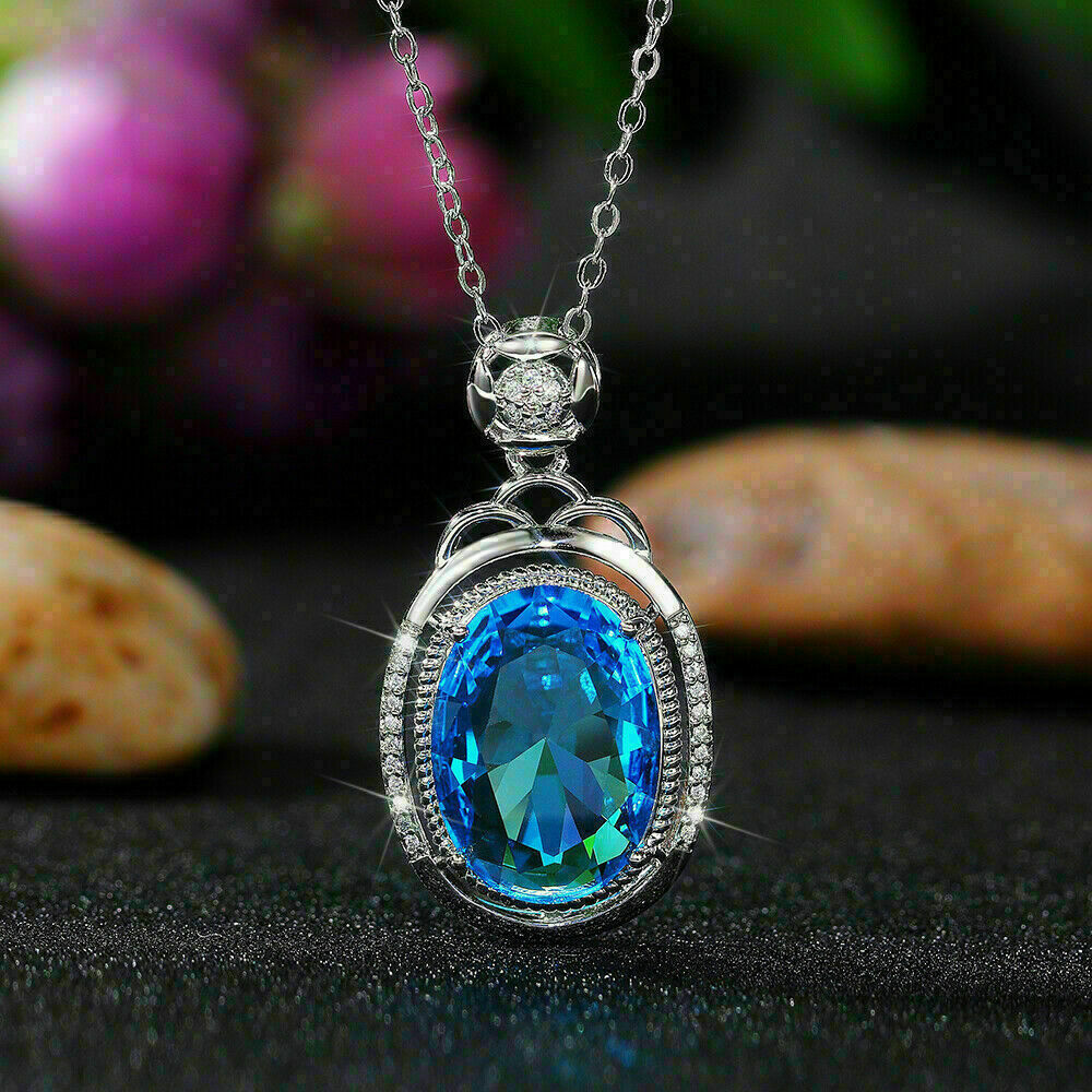 3Ct Oval Simulated Blue Topaz Diamond Pendant 14K White Gold Over Free 18′ Chain