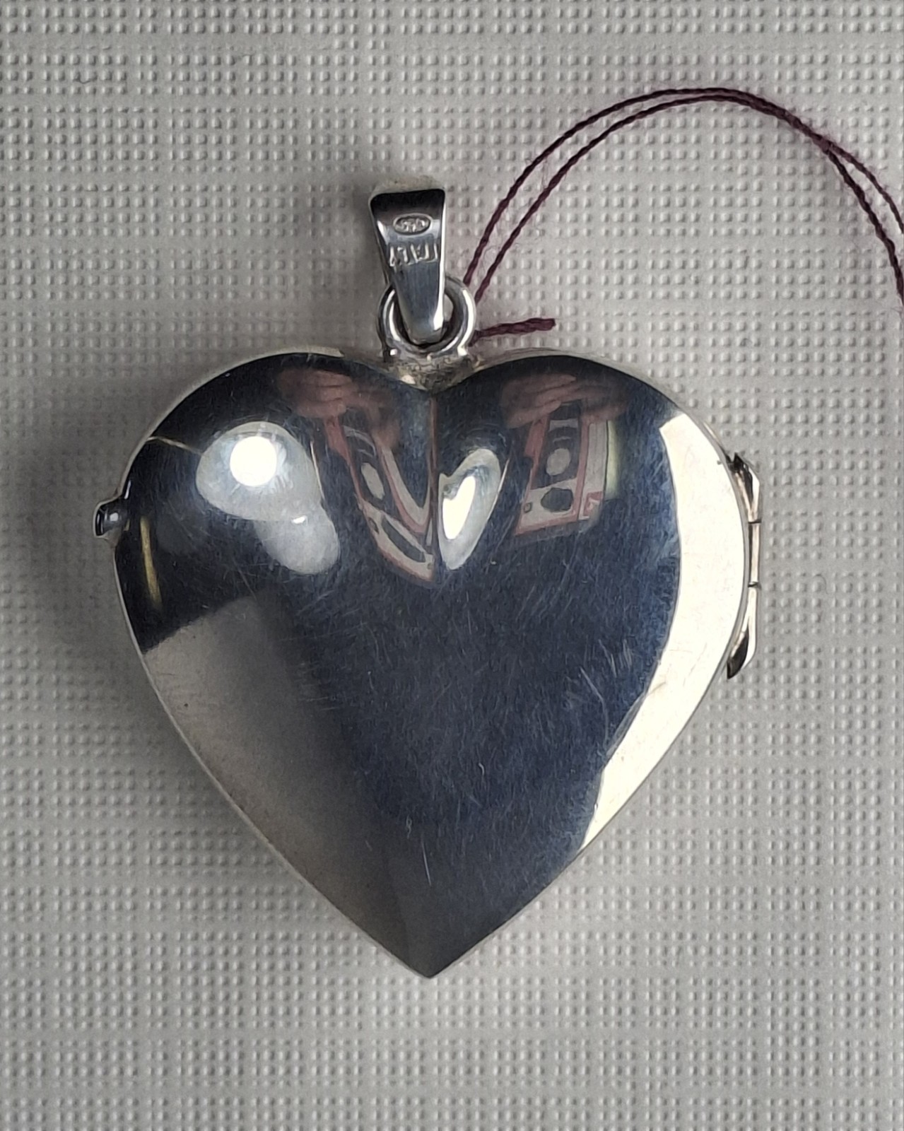 Sterling Silver Heart-Shaped Locket holds 2 photos 1 1/4″ x 1″ Made In Italy