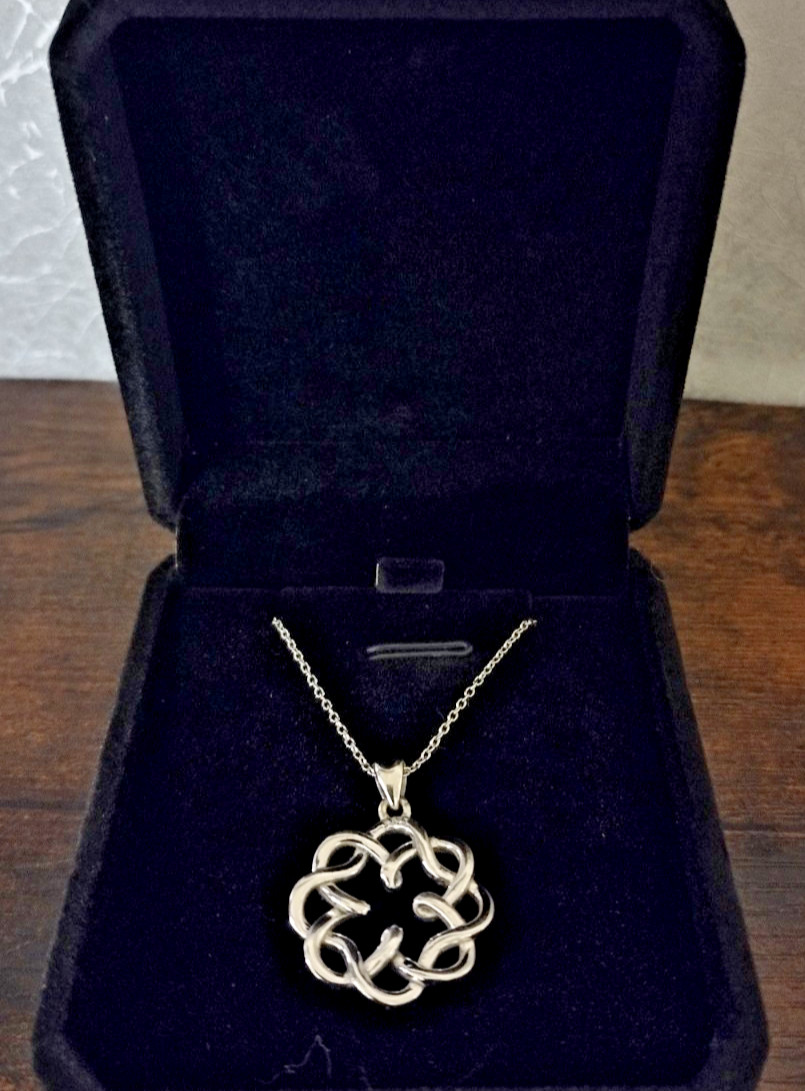 Celtic knot pendant, 1″ wide, .925 silver on an 18″ sterling silver chain.