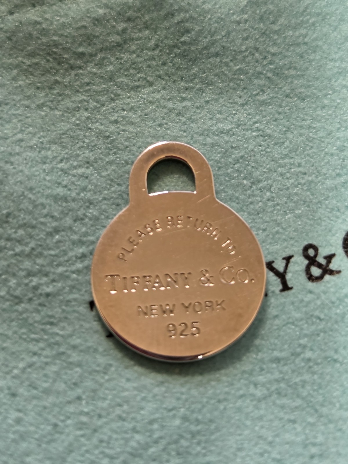 Tiffany & Co. Return to Tiffany 925 Sterling Silver Round Tag Charm Pendant