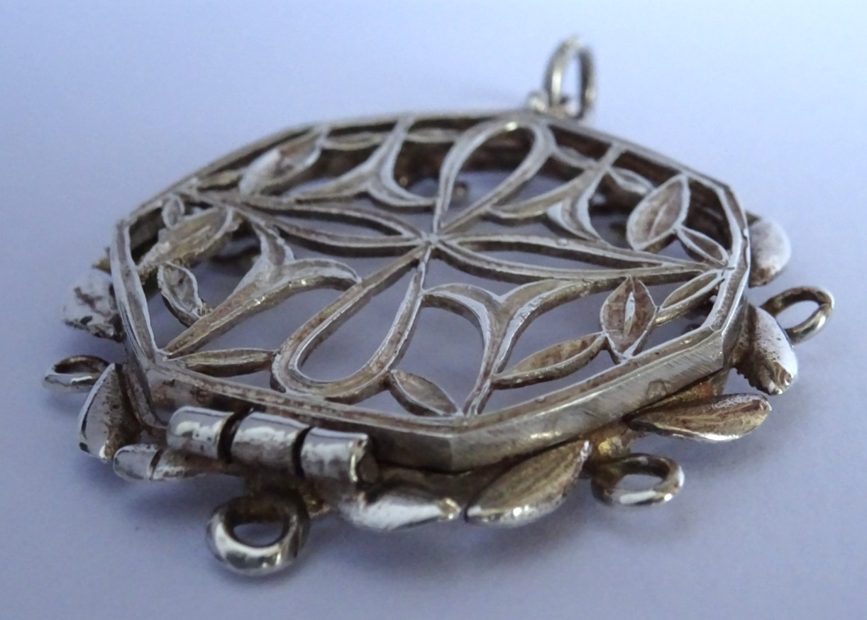 Unusual antique solid sterling silver hinged photo locket pendant