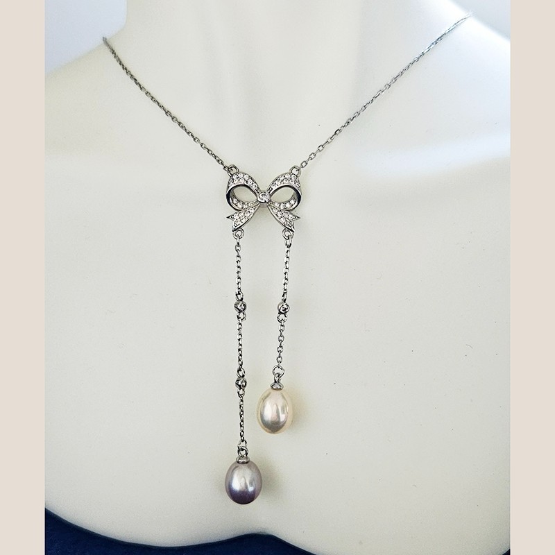 925 Sterling Silver Butterfly Knot with Fresh Water Pearl Tassels