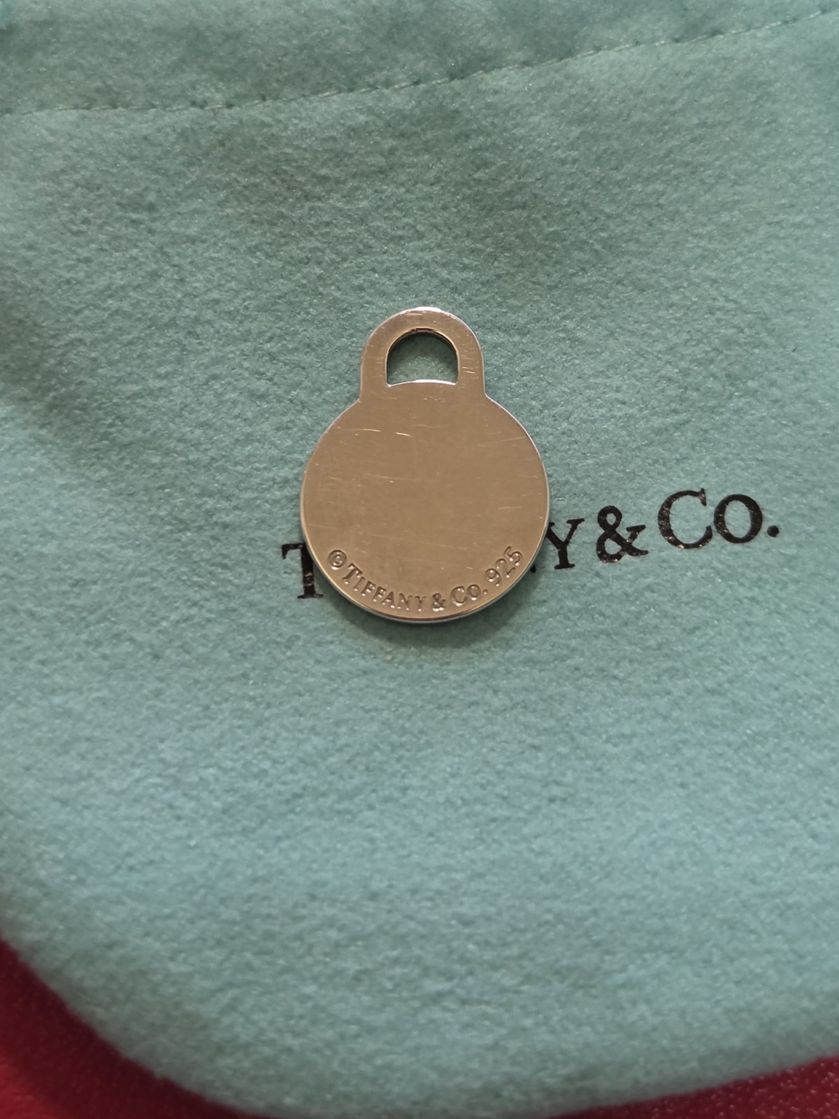 Tiffany & Co. Return to Tiffany 925 Sterling Silver Round Tag Charm Pendant