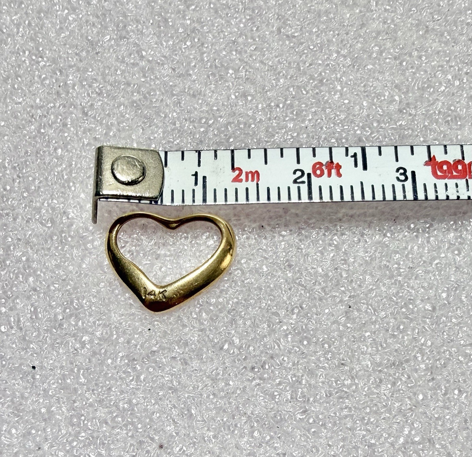 14k Yellow Gold Open Heart Floating 1/2” Pendant .53 Grams