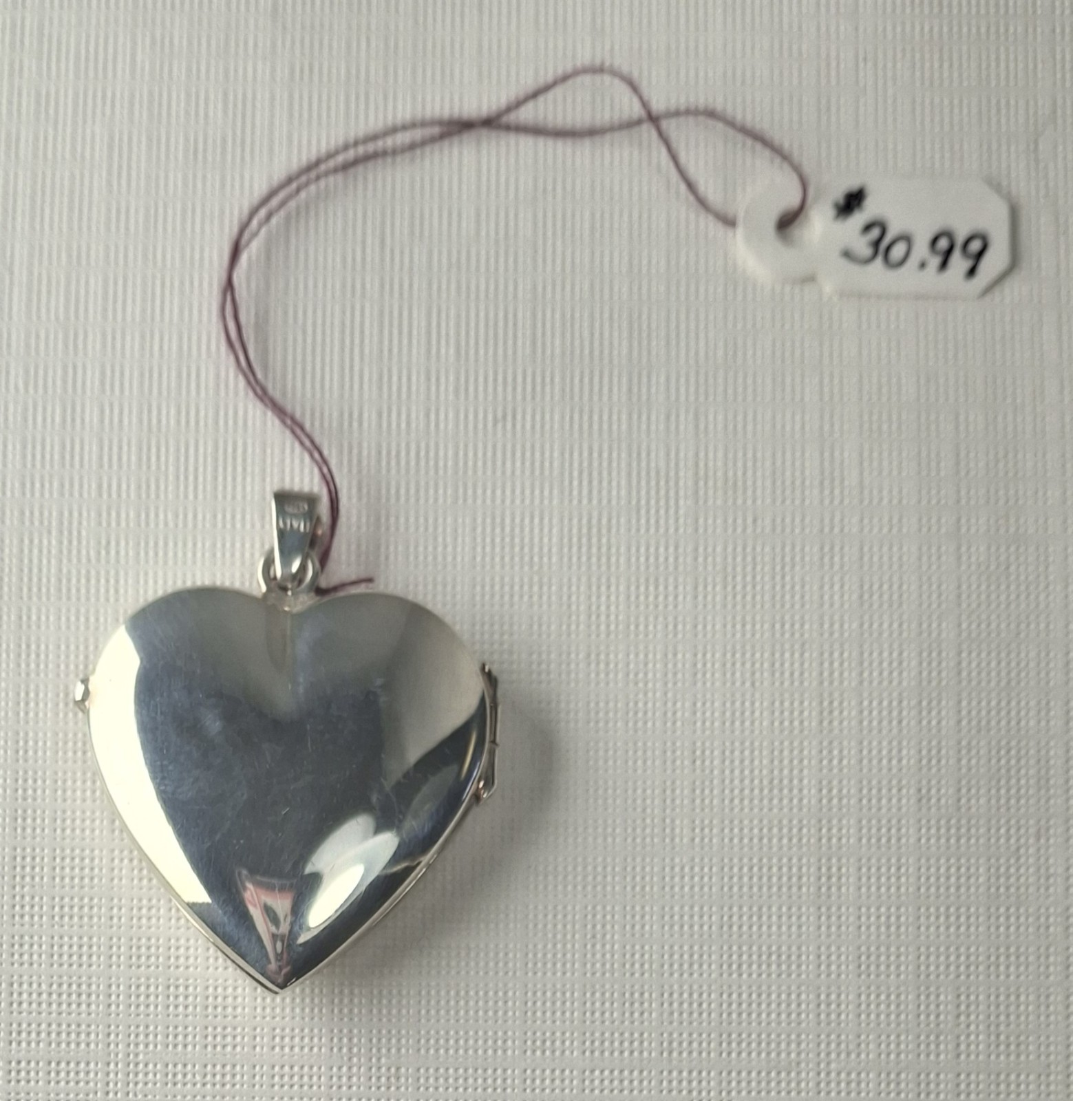 Sterling Silver Heart-Shaped Locket holds 2 photos 1 1/4″ x 1″ Made In Italy