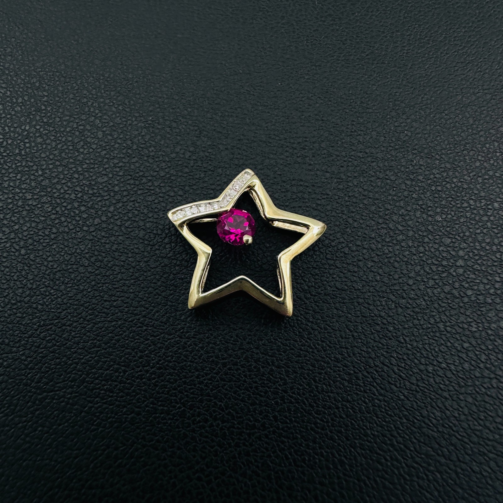 Solid 10K Yellow Gold .25ct Ruby & 7 Diamond Open Star Pendant 16mm, 1.2g