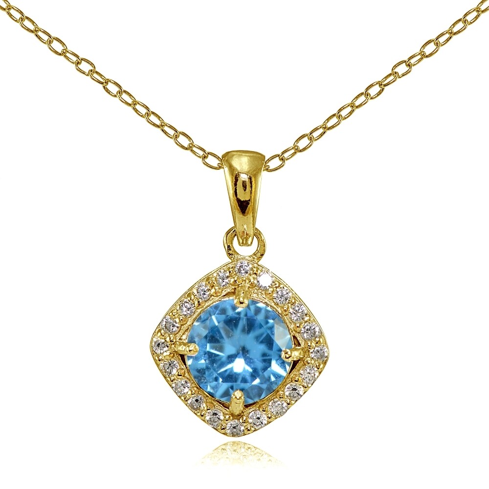 Gold Tone over Silver Simulated Blue Topaz 7mm Round and CZ Accents Necklace