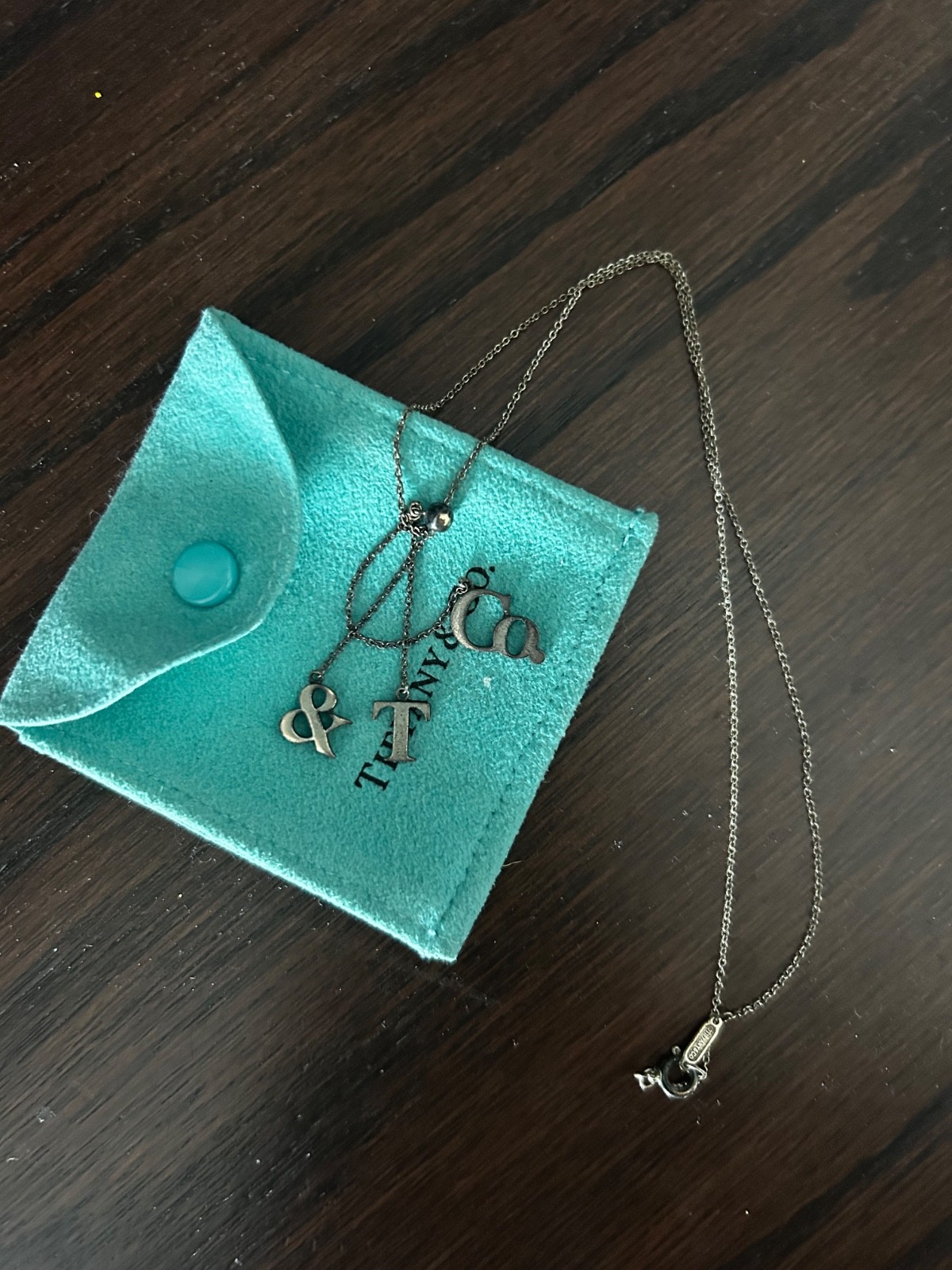 Tiffany & Co Sterling Silver T&CO Letters Lariat Necklace-excellent – no box.