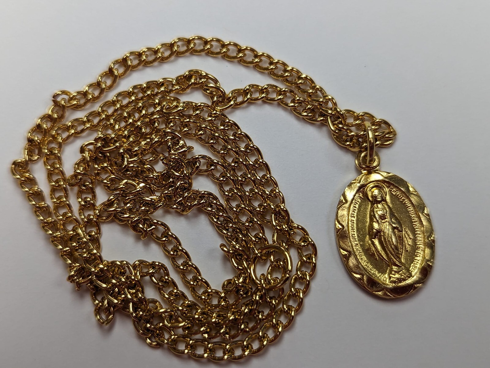 MIRACULOUS Medal Pendant, Oval 3/4″ x 1/2″ Gold Tone Aluminium on 20 inch chain