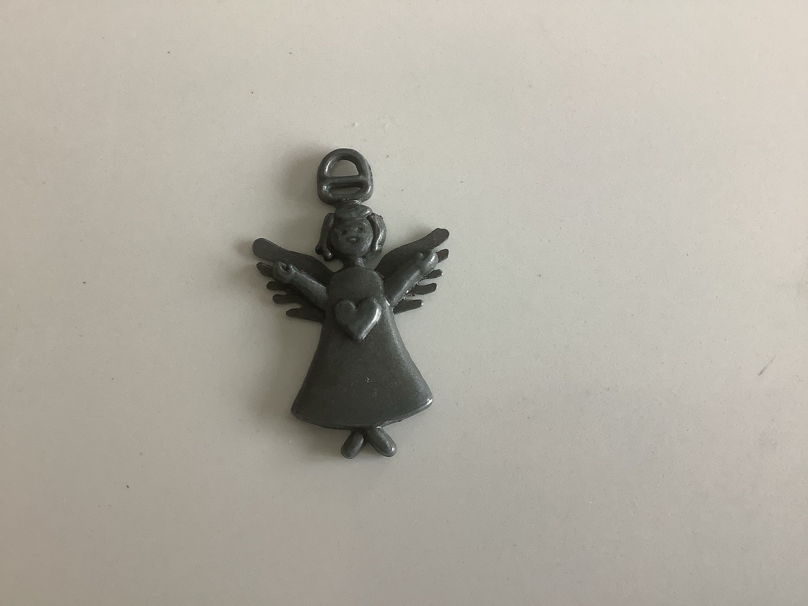Unbranded Silver Tone small 1 1/2” inch Angel with heart pendant charm