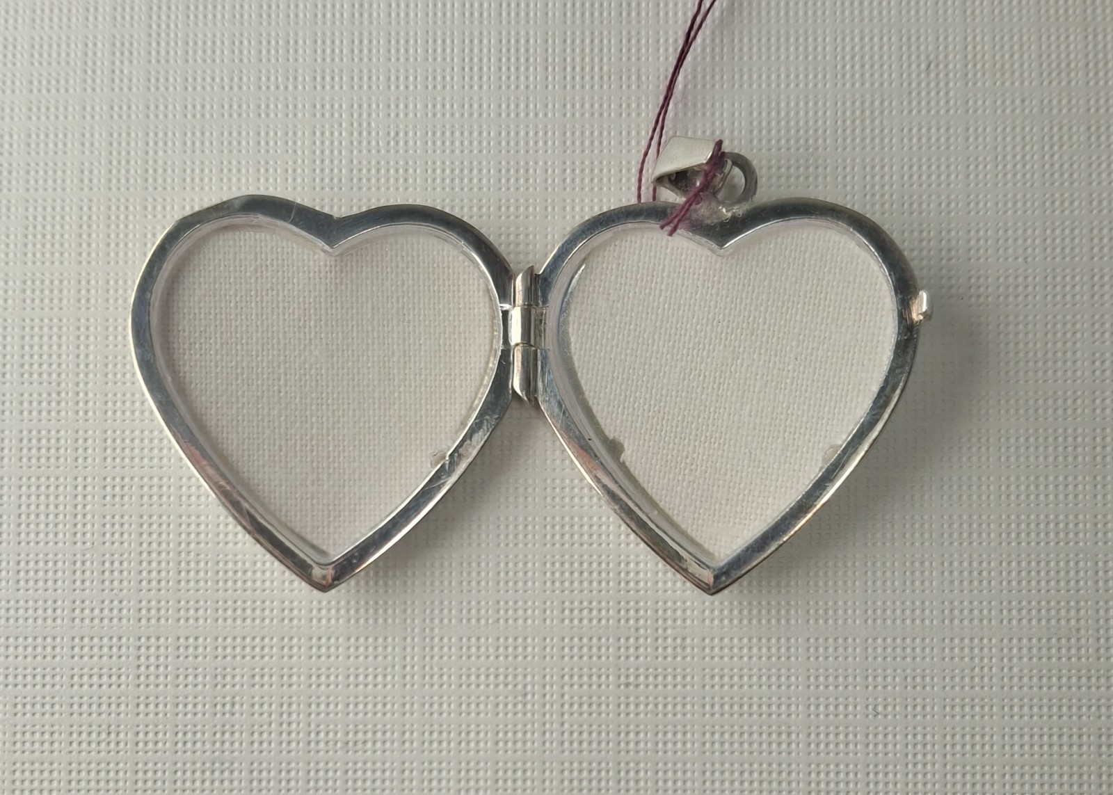 Sterling Silver Heart-Shaped Locket holds 2 photos 1 1/4″ x 1″ Made In Italy
