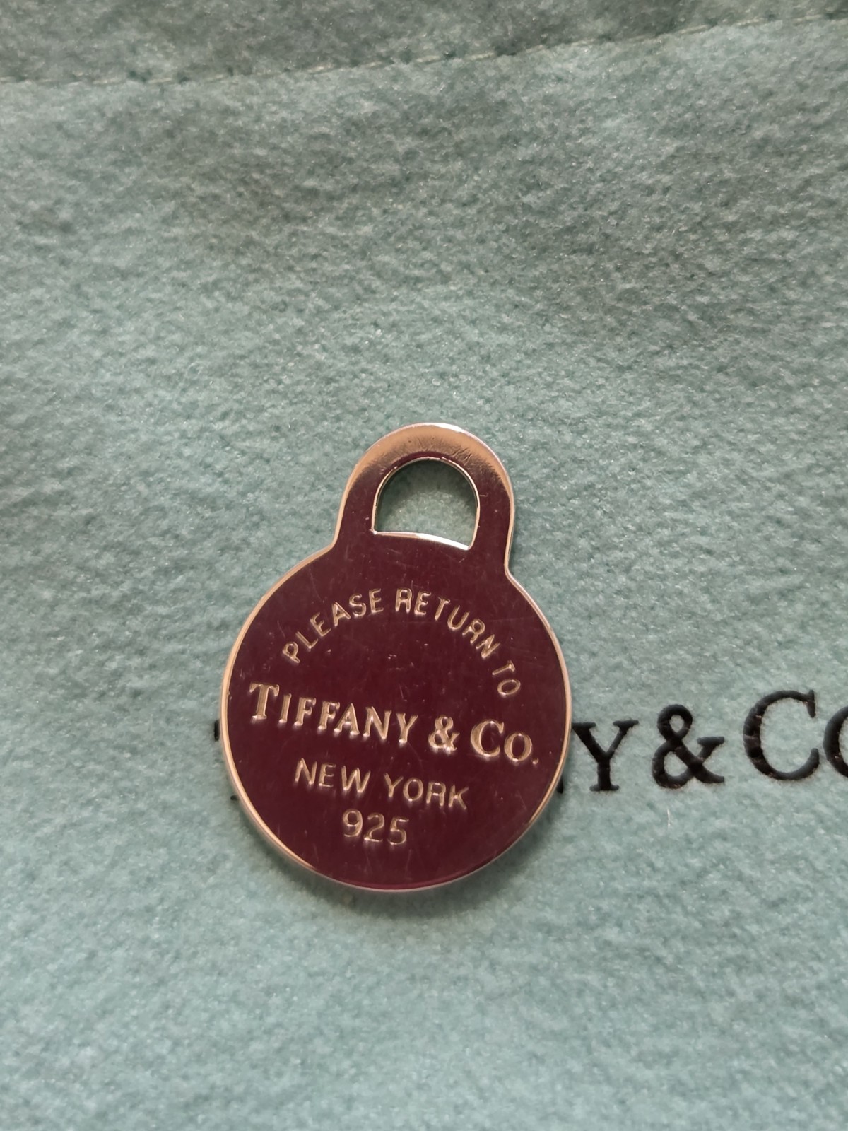 Tiffany & Co. Return to Tiffany 925 Sterling Silver Round Tag Charm Pendant