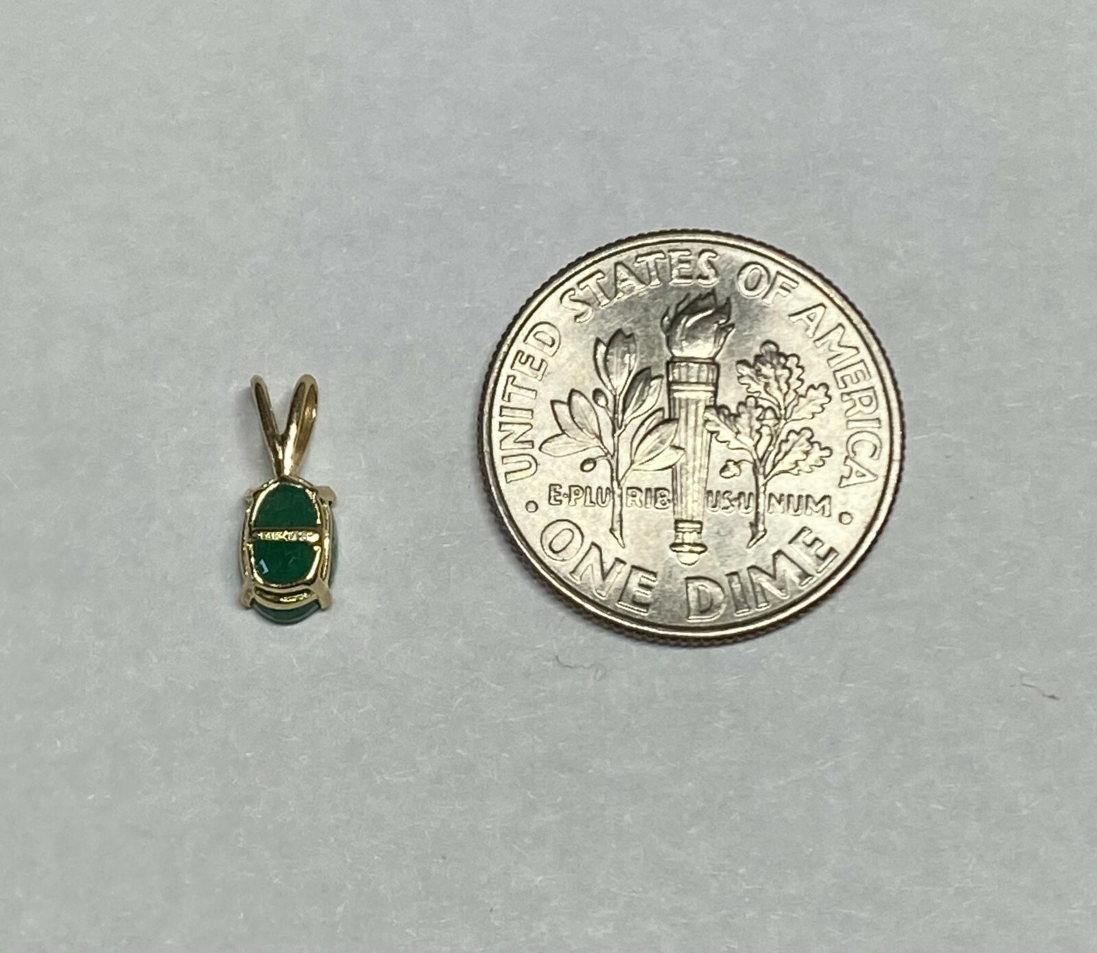 14 Karat Yellow Gold Genuine 6 x 4mm Oval Emerald Pendant (Available w/ Chain)