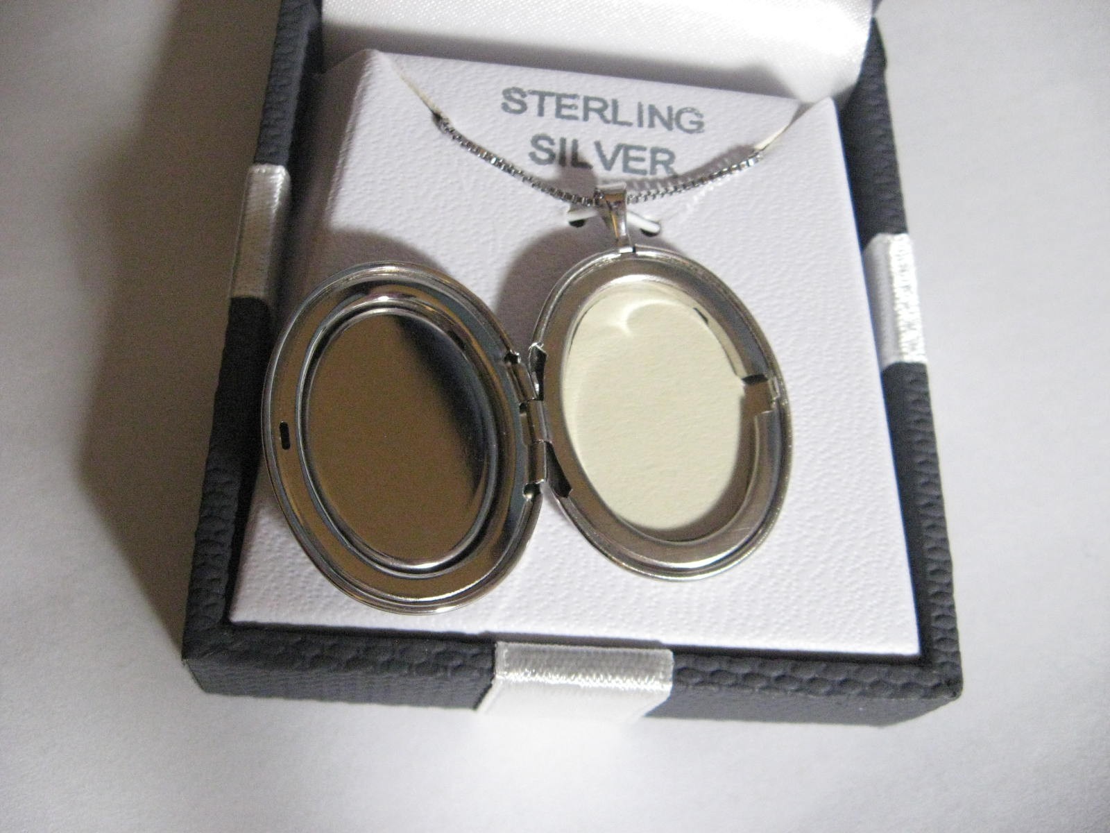 Sterling Silver SS Resin Angel Locket 18″ in original gift box with retail price