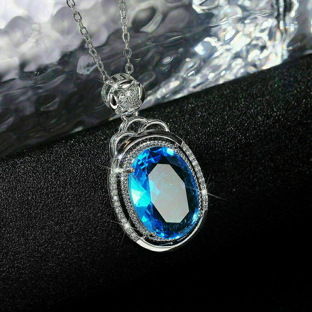 3Ct Oval Simulated Blue Topaz Diamond Pendant 14K White Gold Over Free 18′ Chain