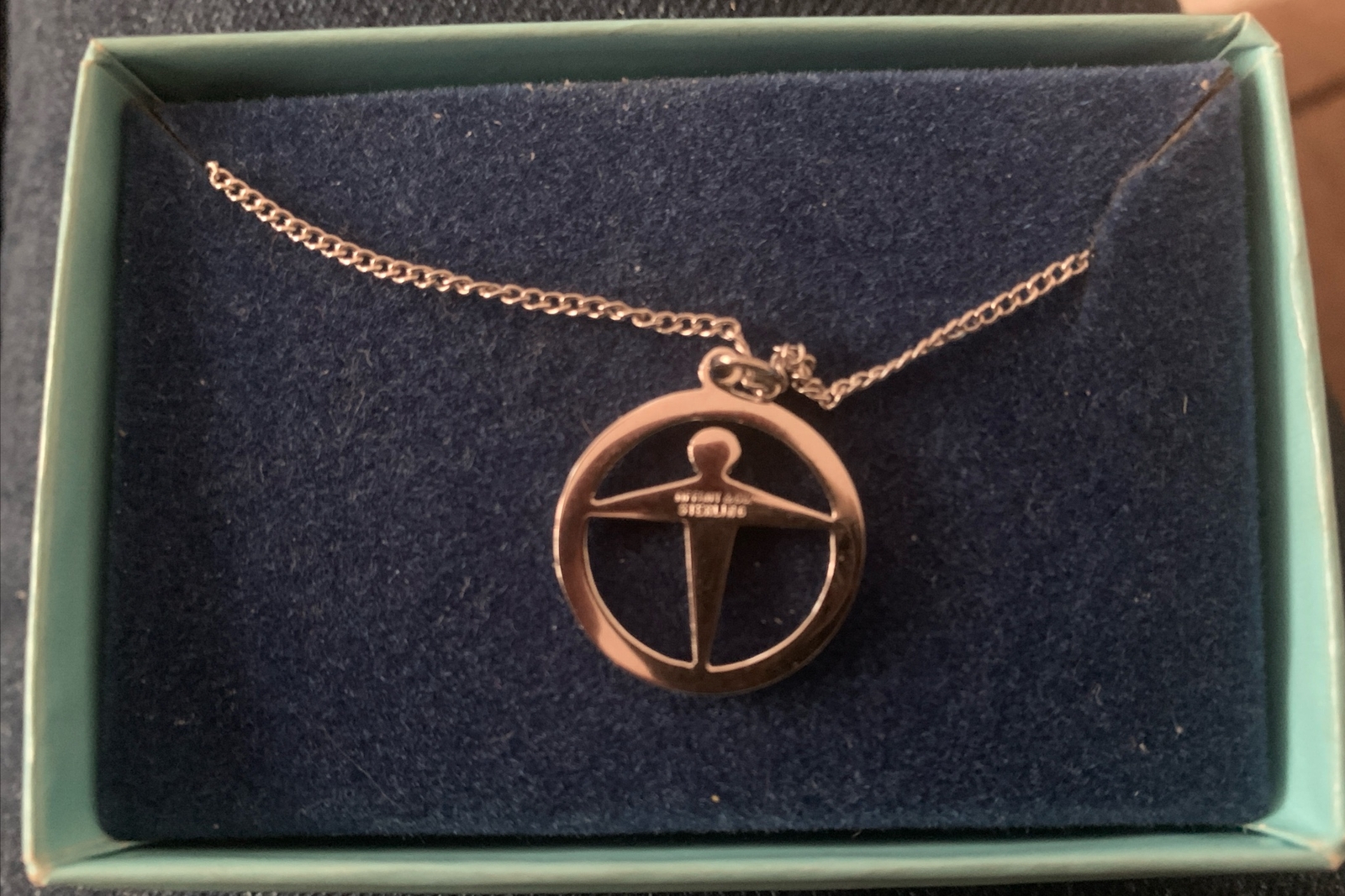Tiffany & Company Manpower Pendant & Generic Sterling Chain