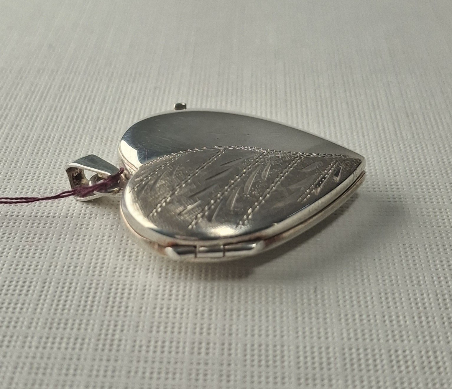 Sterling Silver Heart-Shaped Locket holds 2 photos 1 1/4″ x 1″ Made In Italy