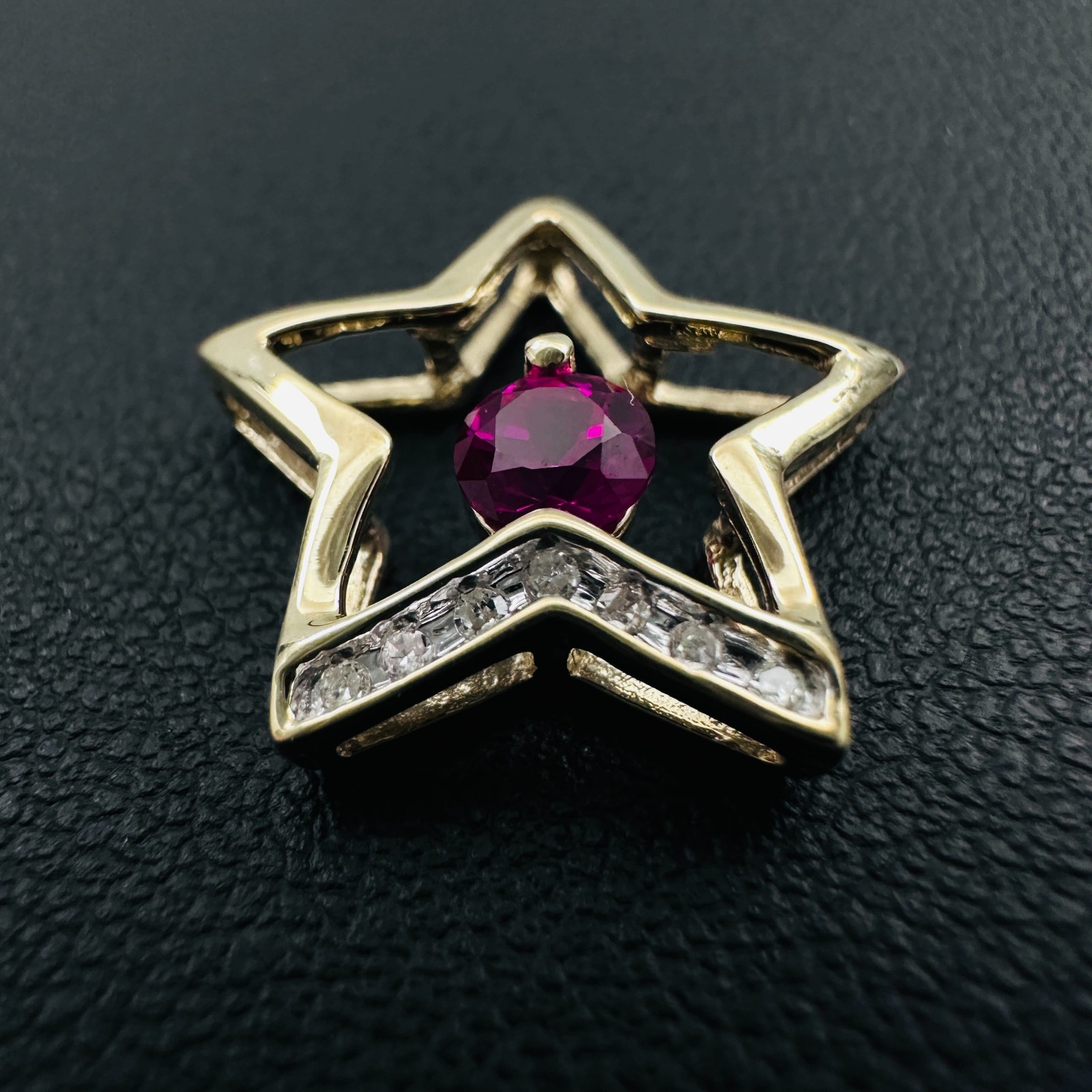 Solid 10K Yellow Gold .25ct Ruby & 7 Diamond Open Star Pendant 16mm, 1.2g