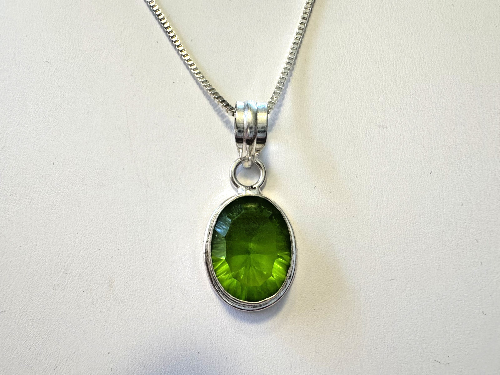 Sterling Silver Pendant with 12 x 16 mm Oval Cut Emerald-Green Chrome Diopside