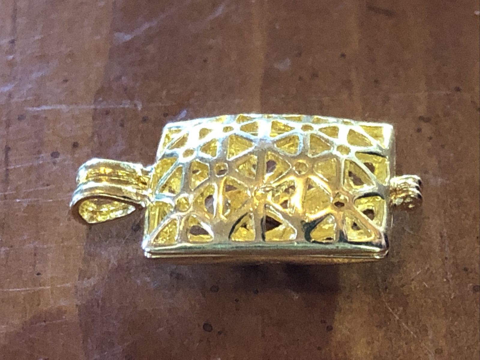 keepsake locked gold pendant