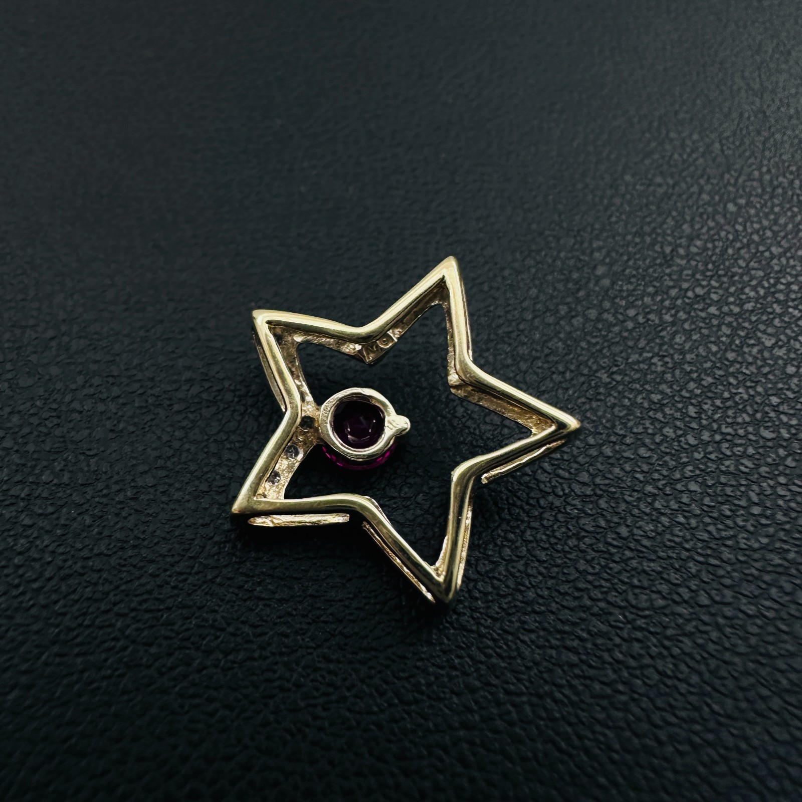 Solid 10K Yellow Gold .25ct Ruby & 7 Diamond Open Star Pendant 16mm, 1.2g