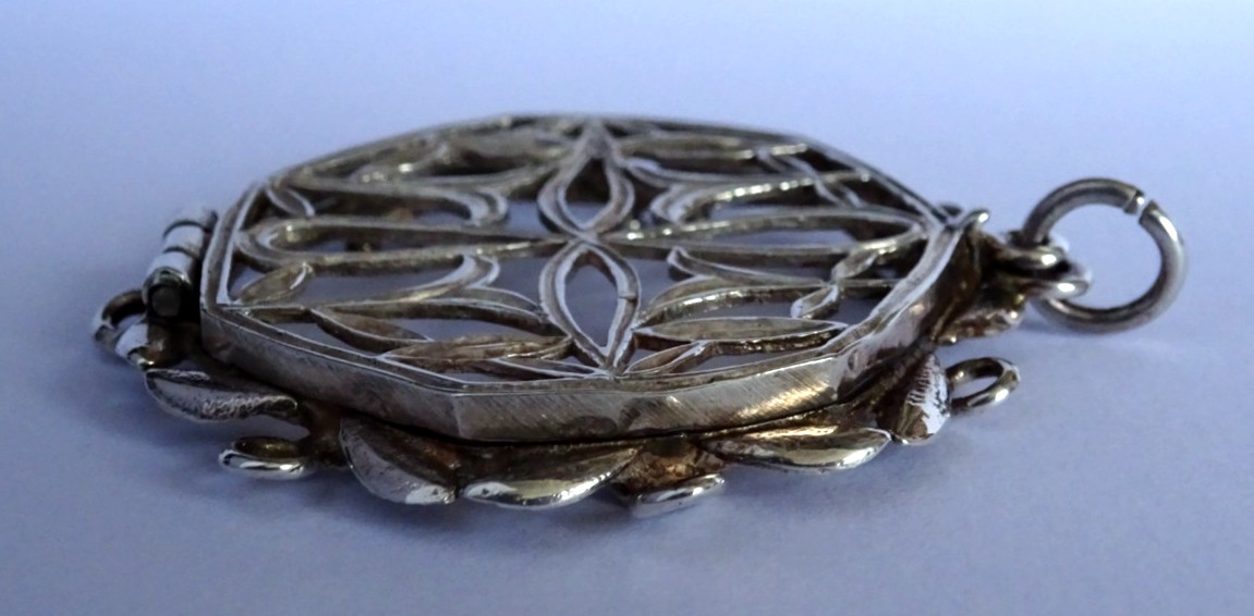 Unusual antique solid sterling silver hinged photo locket pendant