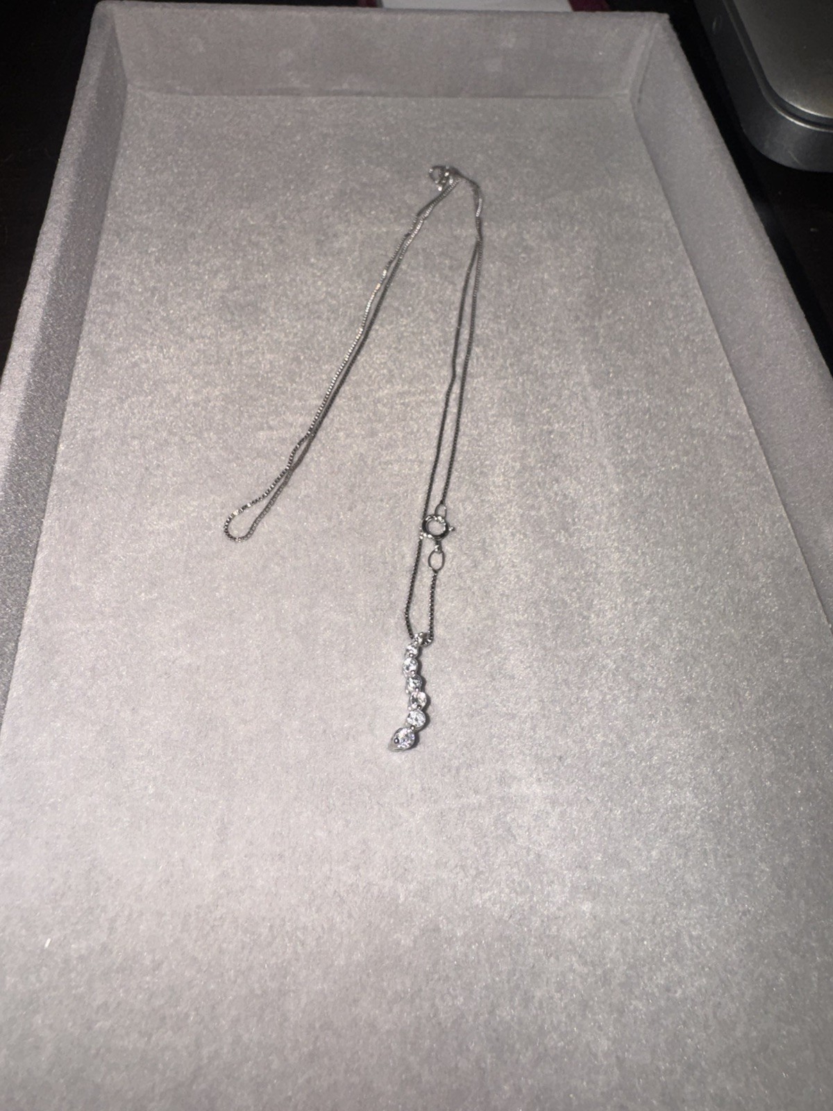 Helzberg Diamonds 10K White Gold 1/4 ct TW Round Diamond Journey Pendant