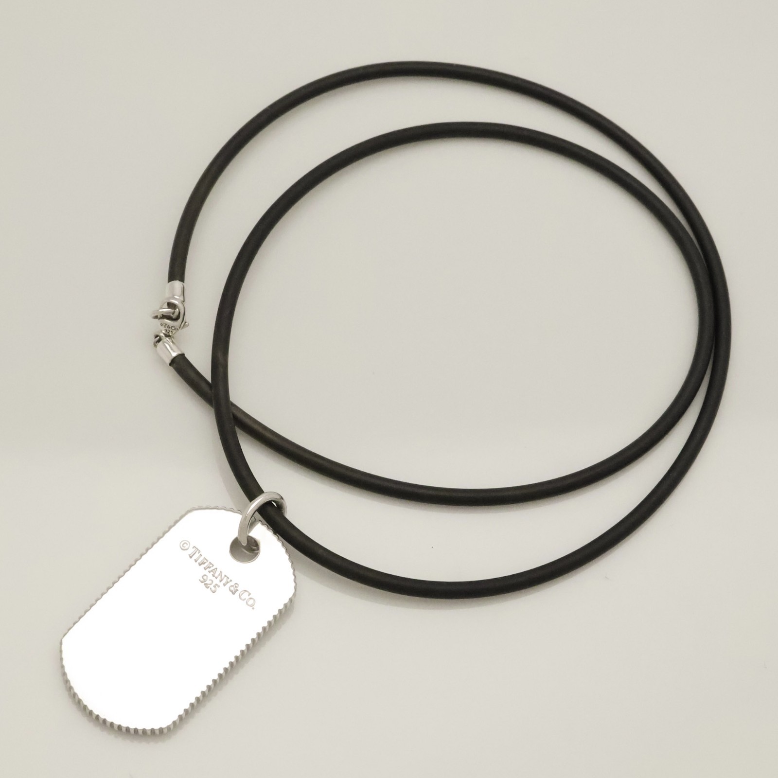 Authentic Tiffany & Co. Coin Edge Dog Tag Rubber Cord Necklace 21.2″ w/Pouch