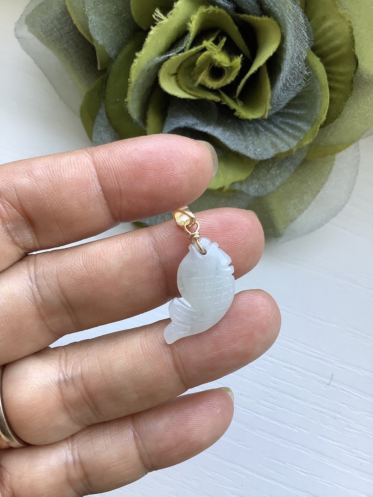 Tiny natural untreated Type A Burmese jadeite fish pendant charm