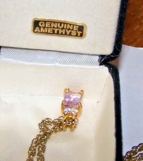 Necklace with Pendant marked Genuine Amethyst. Chain marked “Korea” in case