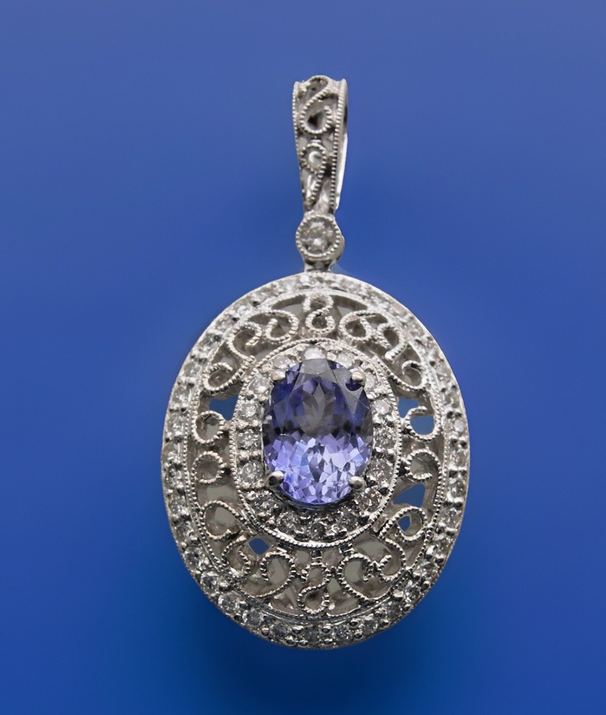 1.37 CT TANZANITE & DIAMOND PENDANT 14K WHITE GOLD
